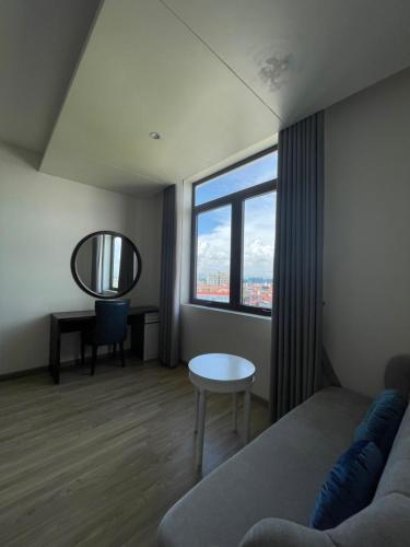 Гостиная зона в Lotus Hotel & Apartment