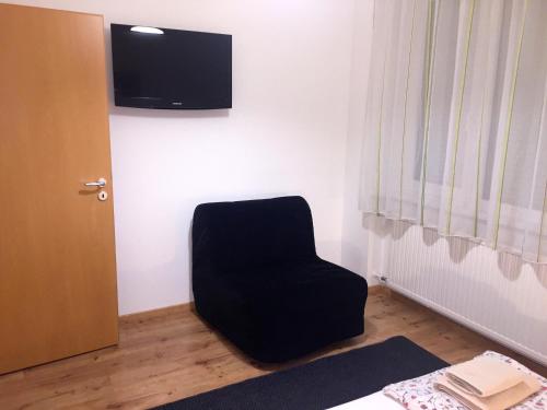 TV a/nebo společenská místnost v ubytování Toldi Apartments Pécs