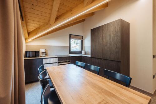 Kuchyň nebo kuchyňský kout v ubytování Residence Piz Aot