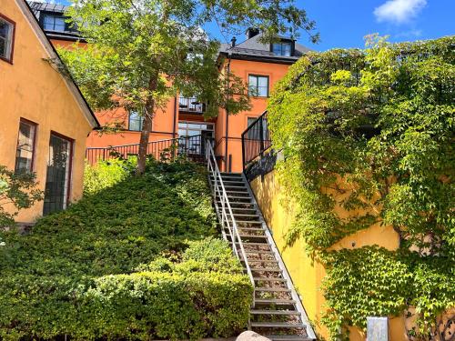 a set of stairs leading up to a building at Akademihotellet in Uppsala