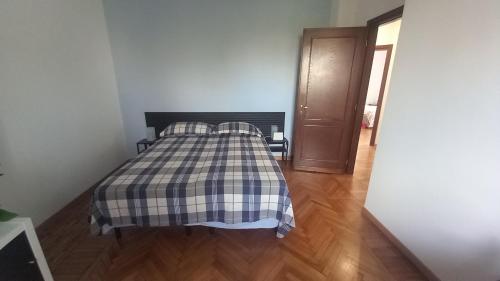 Katil atau katil-katil dalam bilik di Roma Capitale B&B
