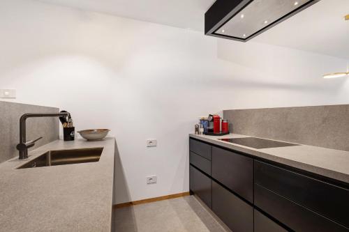Kuchyň nebo kuchyňský kout v ubytování Paradeis Apartments