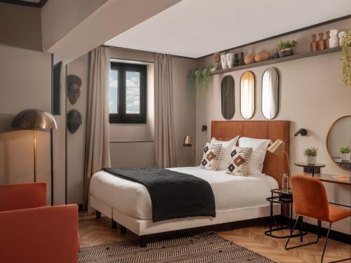 Letto o letti in una camera di Maisons du Monde Hôtel & Suites - Marseille Vieux Port