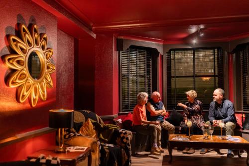 a group of people sitting in a room at The Lansdowne, Eastbourne in Eastbourne