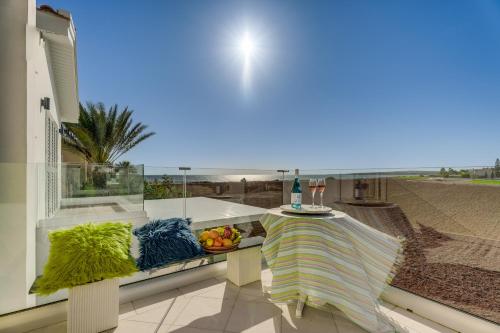 a balcony with a table with a bowl of fruit on it at Villa Jasmine Sirens Beach, CYPR - Dom na Cyprze in Ayia Napa