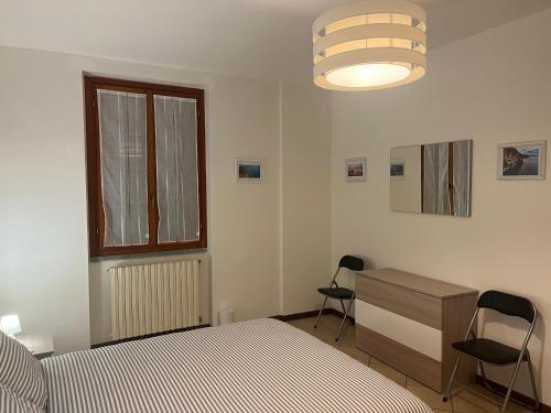 Postel nebo postele na pokoji v ubytování Casa vacanze due laghi cadrezzate
