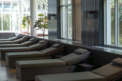 a row of seats in a waiting room at Radisson Blu Hotel Dortmund in Dortmund