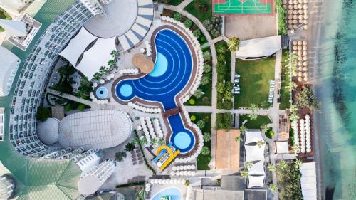 an aerial view of a pool at a resort at Prive Hotel Didim - Ultra All Inclusive in Didim