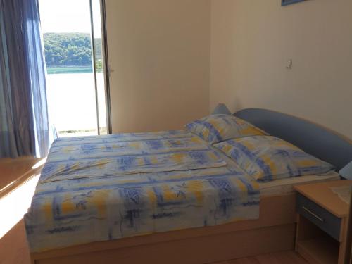 Posteľ alebo postele v izbe v ubytovaní Apartment Ren