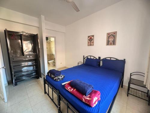 Postel nebo postele na pokoji v ubytování Family Apartment near Calangute Baga Beach