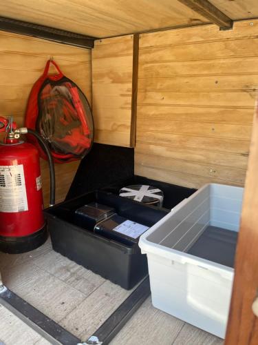 a box in the inside of a room with a fire hydrant at CamperVan totalmente equipada - CasaRodante - MotorHome in Santiago