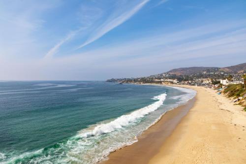 a view of a beach and the ocean at Pacific Edge Hotel in Laguna Beach