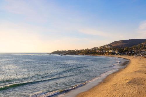 a beach with a view of the ocean at Pacific Edge Hotel in Laguna Beach