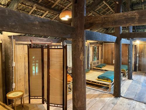 Postel nebo postele na pokoji v ubytování Háo Hức Village, Thai Nguyen