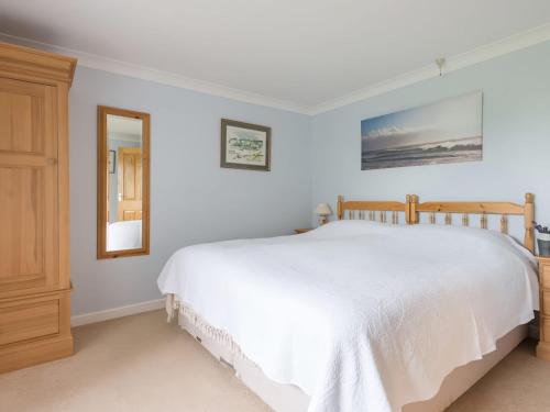 Ένα ή περισσότερα κρεβάτια σε δωμάτιο στο Curlew