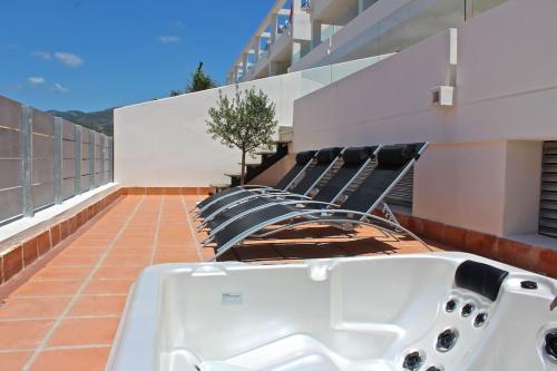 Modern apartment with view to Gibraltar, large terrace and jacuzzi