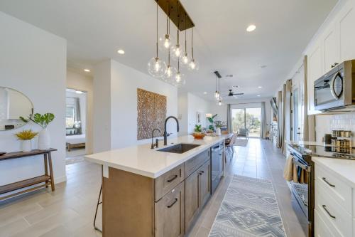 a kitchen with a sink and a counter top at Hikers Retreat with Furnished Patio in Rimrock! in Rimrock
