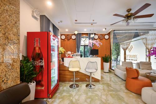 a coca cola store with a coke machine in a room at Ly Ly Hotel 2 Binh Tan District in Ho Chi Minh City
