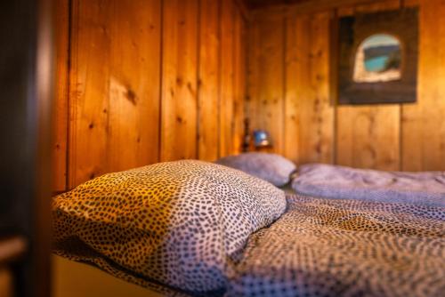 Cama o camas de una habitación en Chez Astrid