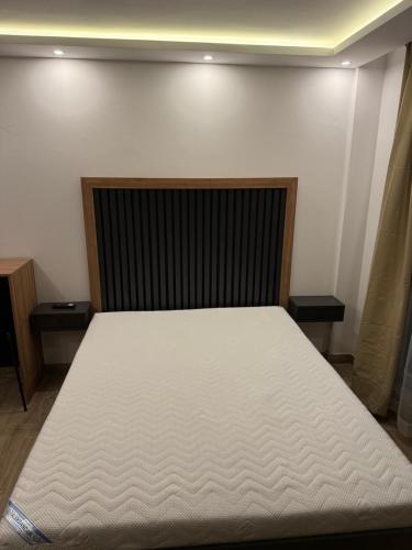 Кровать или кровати в номере Sophie & Sarah Apartments - Residence Hill, Kopaonik