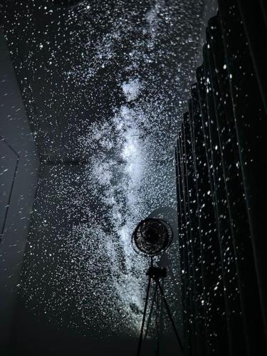 a view of the milky way from the ceiling of a building at Gabiežezers Holiday House, 30km from Riga in Cena
