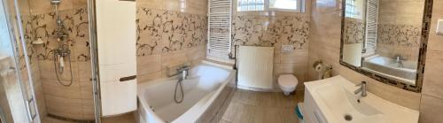 Et badeværelse på Ezo Apartmanház Balatonberény