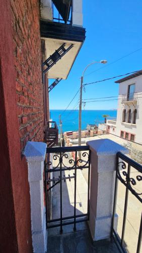 a view of the ocean from the balcony of a building at Hotel Boutique Domus Mare in Viña del Mar