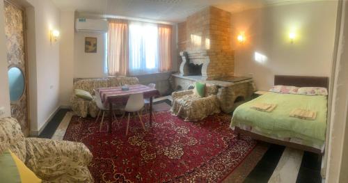Postel nebo postele na pokoji v ubytování Guest House Lilia