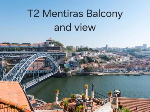 a view of a bridge over a river at Arco Apartments in Porto