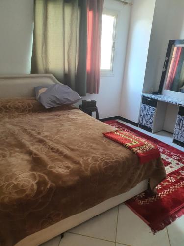 Postel nebo postele na pokoji v ubytování Legendary Sharjah