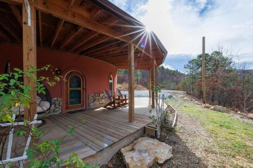 a porch of a house with a wooden deck at Secluded LUX Bunker Hot Tub, Views & Trails in Stanley