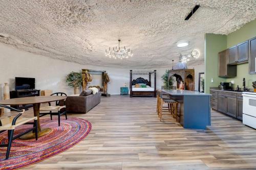 a kitchen and living room with a table and chairs at Adults Only - Secluded Mountainside Dome Retreat in Stanley
