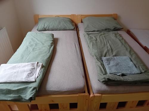 Postel nebo postele na pokoji v ubytování Holub apartment in city centrum