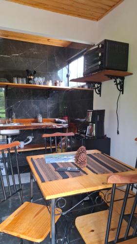 TV a/nebo společenská místnost v ubytování Rancho Terra Mauá