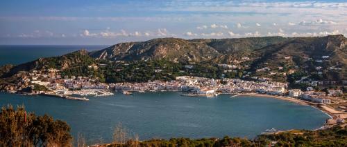 an aerial view of a bay with boats in the water at Hostal La Tina in Port de la Selva