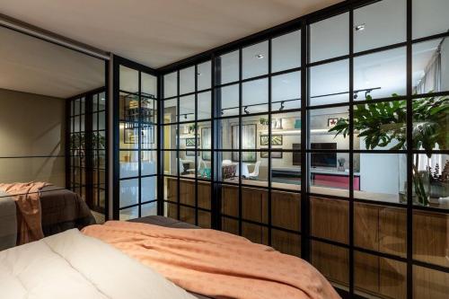 Ένα ή περισσότερα κρεβάτια σε δωμάτιο στο Apartamento do Centro de Foz