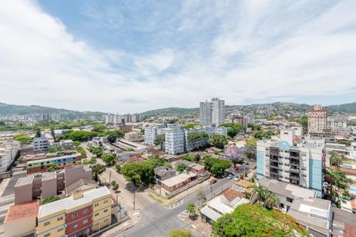 an aerial view of a city with buildings at Connect by LikeHome in Porto Alegre