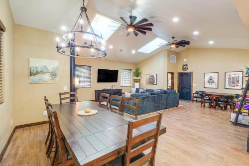 a dining room and living room with a table and a couch at Furnished Gazebo with View Rustic Williams Retreat! in Williams