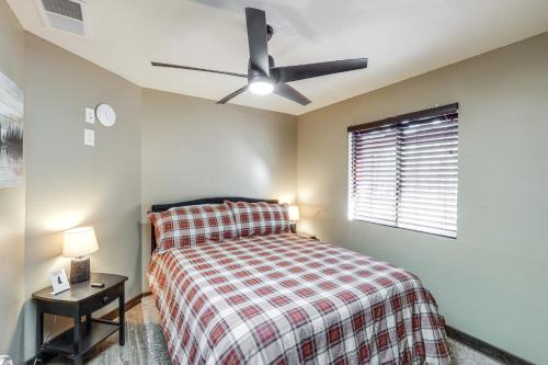 a bedroom with a bed and a ceiling fan at Furnished Gazebo with View Rustic Williams Retreat! in Williams
