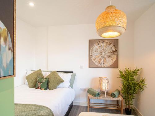 Ένα ή περισσότερα κρεβάτια σε δωμάτιο στο Lovely studio apartment Sheffield