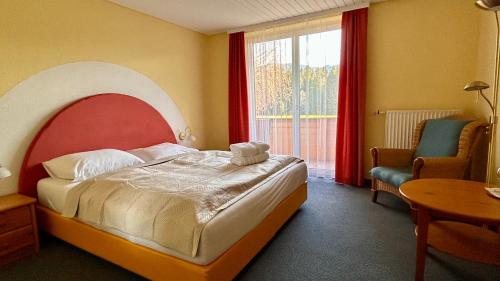 Postel nebo postele na pokoji v ubytování Pension Edelweiß Mitterberg