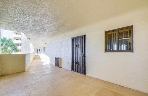 an empty hallway with a door in a building at Scenic Balcony and Beach Access Hudson Condo in Hudson