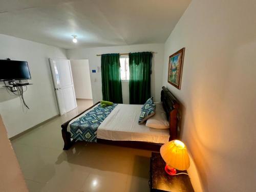 Postel nebo postele na pokoji v ubytování Limsor Apartahotel