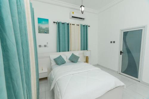 Katil atau katil-katil dalam bilik di Skobs Apartment