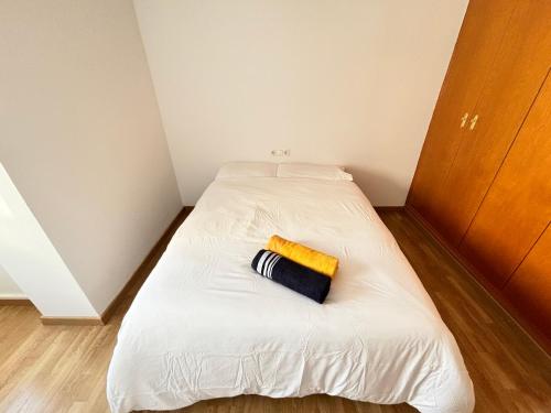 En eller flere senge i et værelse på Cute and Cosy Room