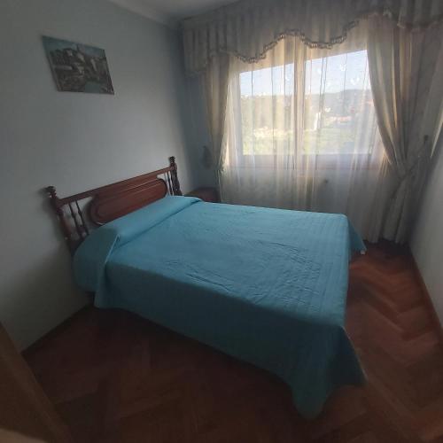 Postel nebo postele na pokoji v ubytování casa bembrive planta 1