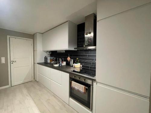 Η κουζίνα ή μικρή κουζίνα στο Cozy room near city centre