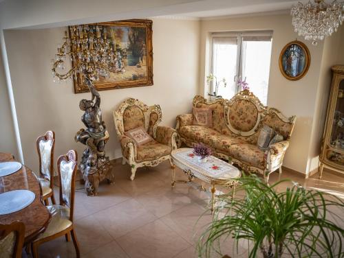 Posezení v ubytování Prywatny Dom z Parkingiem Trzy Sypialnie Self check-in Faktura