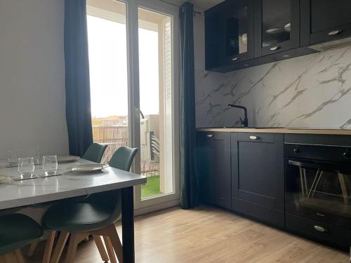 Η κουζίνα ή μικρή κουζίνα στο Havre de paix en appartement