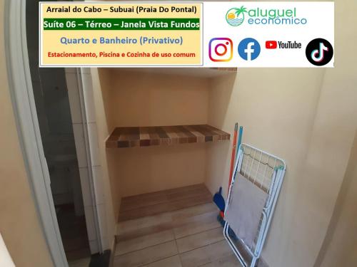 a room in a building with a shelf and a staircase at Arraial do Cabo – Subuai Village - Aluguel Econômico in Arraial do Cabo